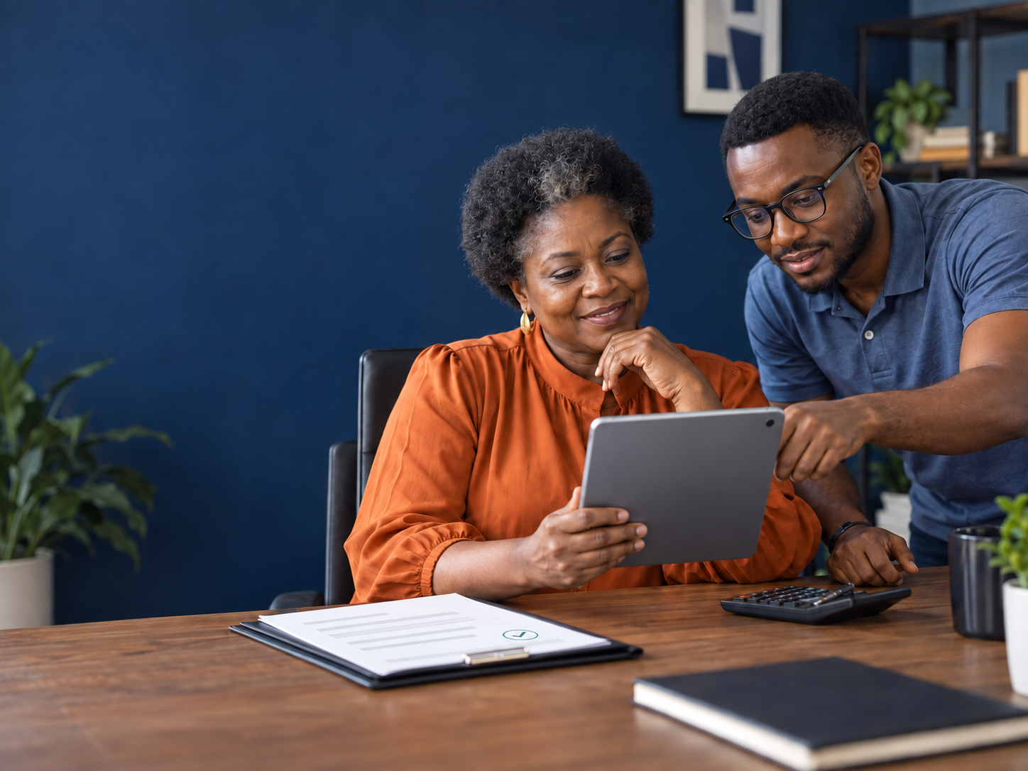 A Nigerian business team reviewing a protected vendor payment